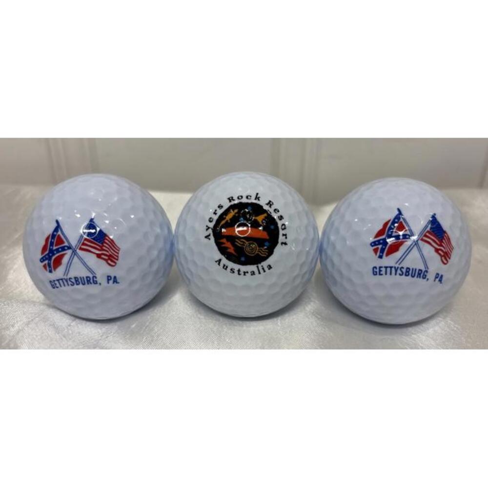 Lot of 3 Spalding Golf Balls 1 Ayer’s Rock Resort Australia & 2 Gettysburg PA